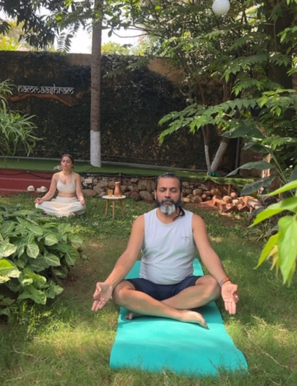 Meditation on mats in the garden