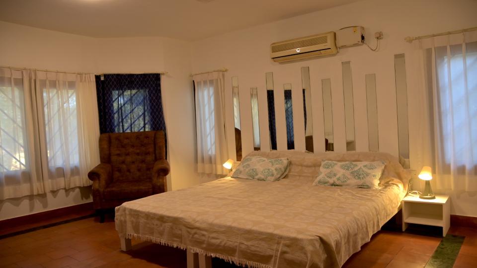 Radha at Namma Ashram — the bed and headboard